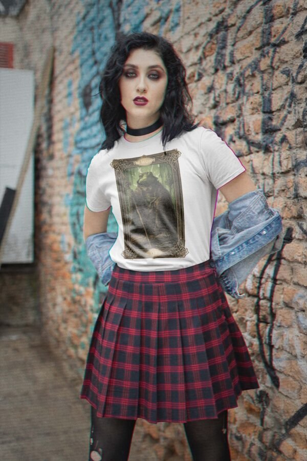 a woman in a skirt and t - shirt standing in front of a wall