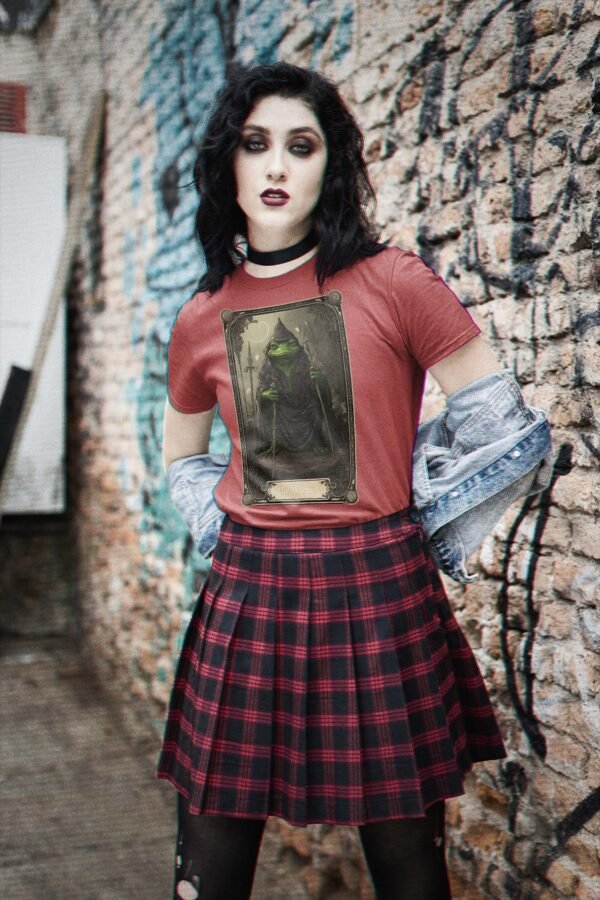 a woman in a red shirt and plaid skirt