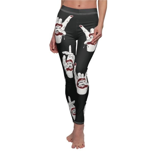 a woman's leggings with the image of two hands making a peace