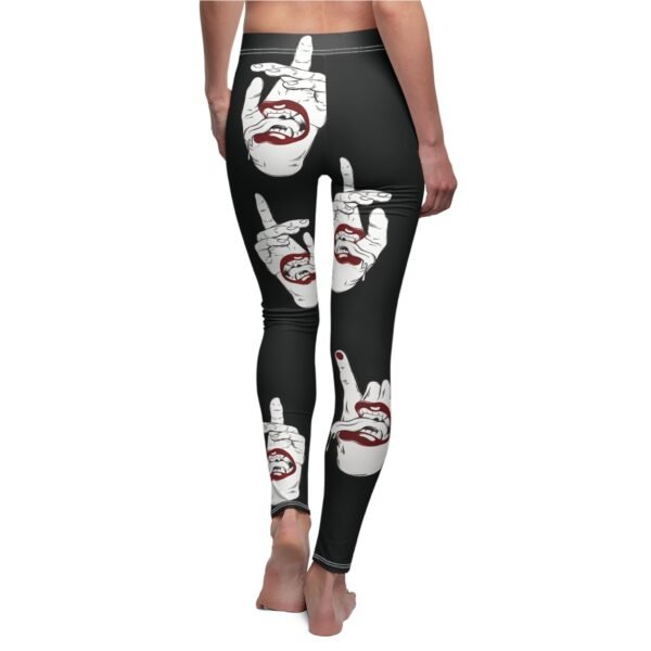 a woman's leggings with the image of a hand making a peace