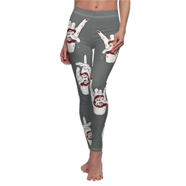 a woman's leggings with the image of two hands making a peace