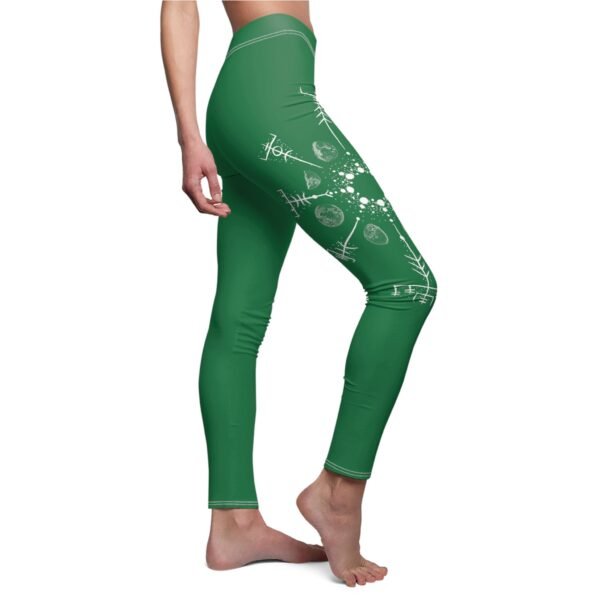 a woman in green leggings with a green design