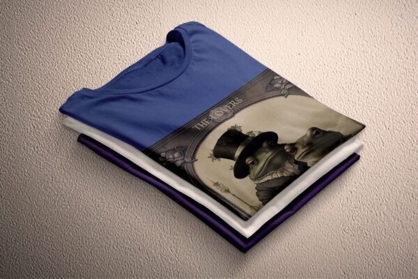 a folded t - shirt with a picture of a man and a woman on it