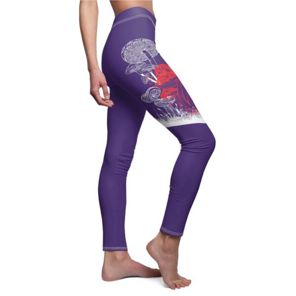 a woman wearing purple leggings with a red and white design