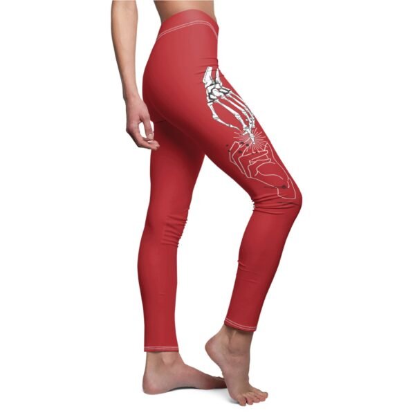 a woman in red leggings with a skeleton on it