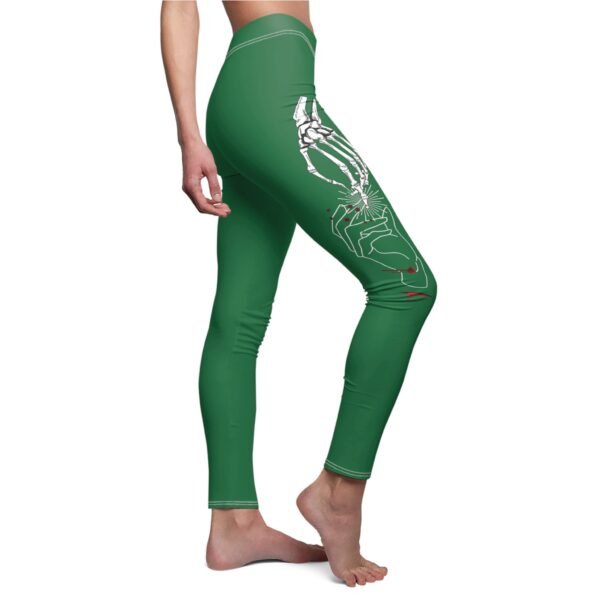 a woman in green leggings with a skeleton on it