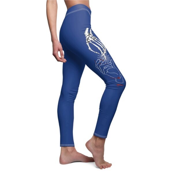 a woman in blue leggings with a skeleton on it