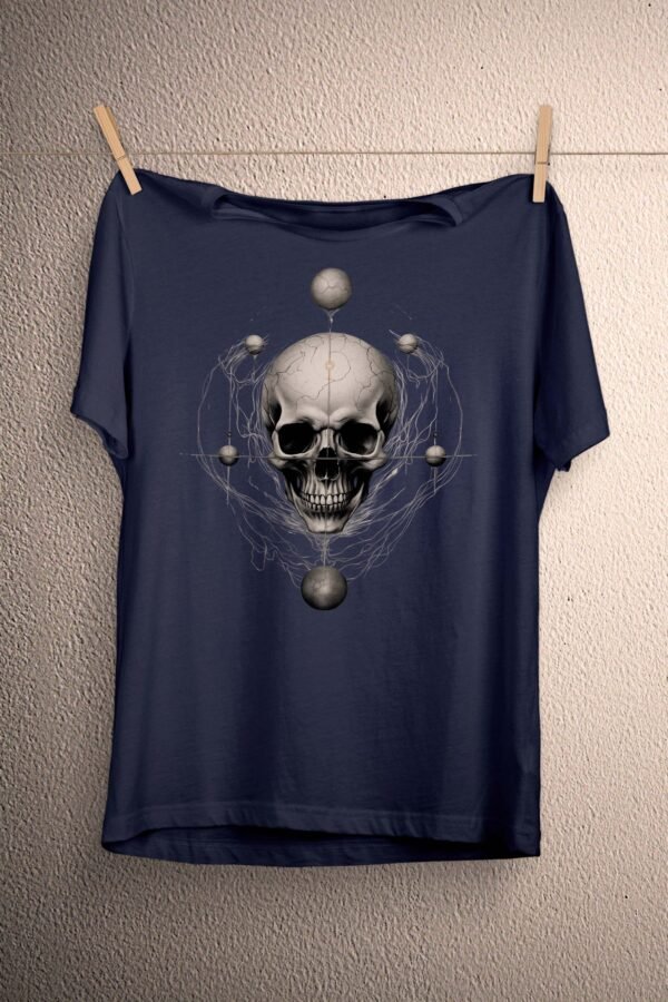 a t - shirt with a skull on it hanging on a clothes line