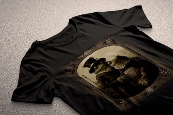 a black t - shirt with a picture of a man and a woman