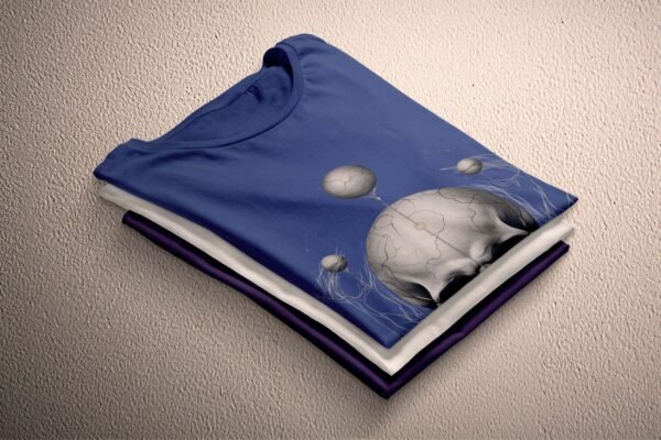 a blue shirt with a picture of planets on it