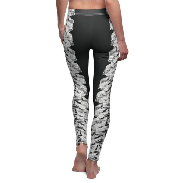 a woman's leggings with a black and white floral design