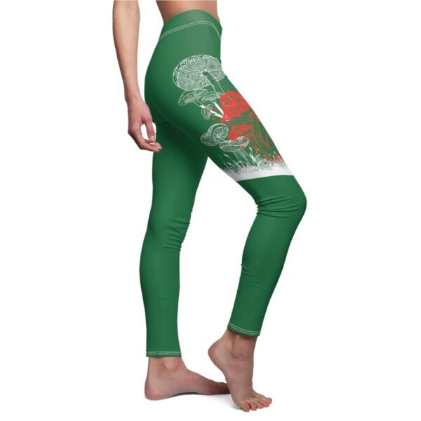 a woman in green leggings with a red dragon on the side