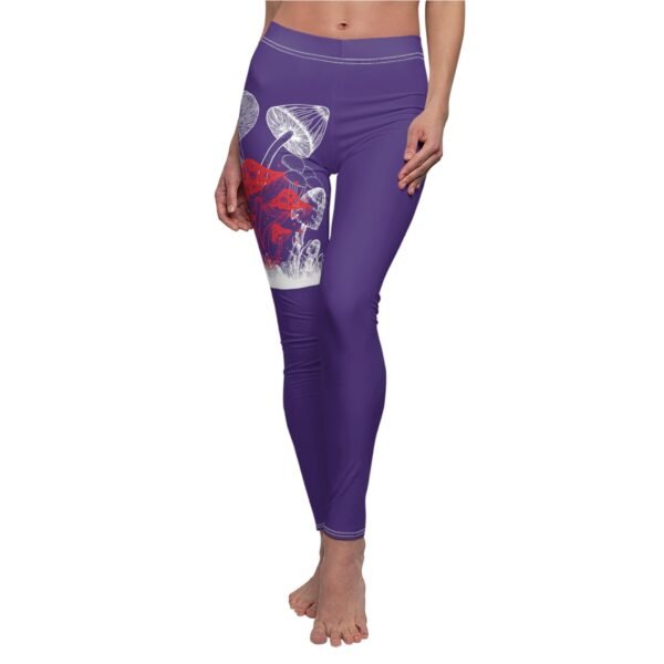 a woman in purple leggings with a red and white design on the side