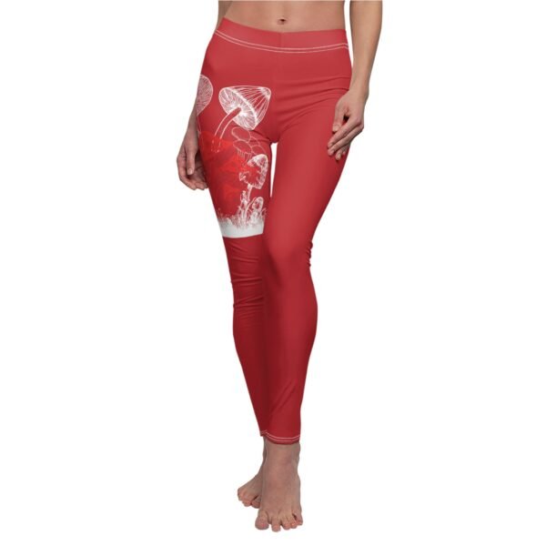 a woman wearing red and white yoga pants