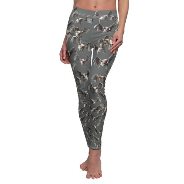 a woman in grey pants with birds on it