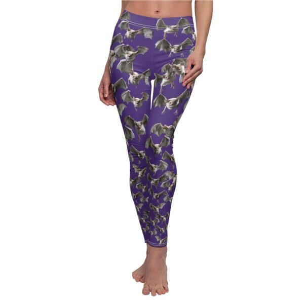 a woman wearing a purple floral print leggings