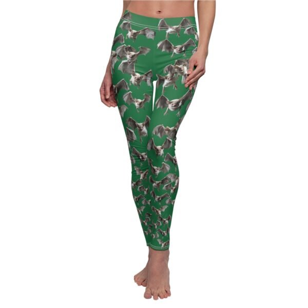 a woman in green pants with a dog on it